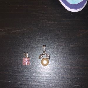 Two necklace pendants